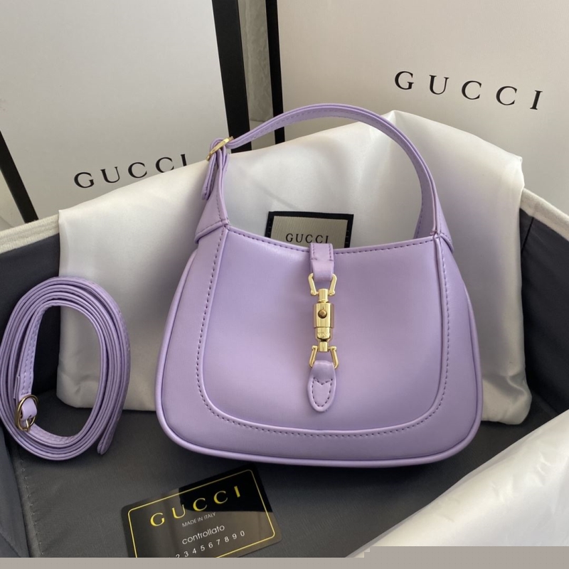 G*u*i top handle bags